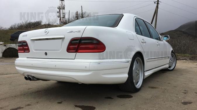 Задний бампер AMG Mercedes W210 рестайлинг